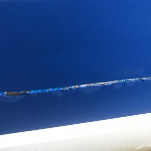 Damage to C-Traveler from angle iron on the bottom of the dock, see previous photo