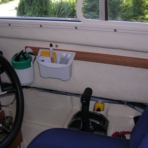 Starboard mount for accessories such as shown.  1/2" oak secured with 5200.