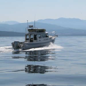 Media 'JC Lately headed home to Sequim Bay after a trip to PT.' in album '"Enforcement" came in with the Indian canoes.  It's a support boat traveling with the "Tribal Journey -07"'