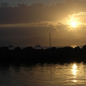 Media 'Sunrise over the breakwater in Santa Barbara harbor.' in album '(Islander) Islander visits Santa Barbara for Presidents Day'