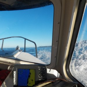 The "afternoon" winds came up at 10:15 and the swells stacked at Bajo Point.  I turned and surfed back to Yuquot.