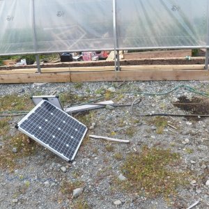 Solar power runs a drip irrigation.  It was quite warm inside even with the vents open.