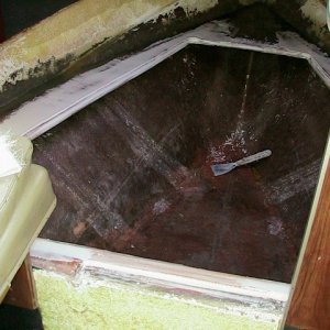 Media 'arrg! she's taking shape now donchano :oP relocated the potty to fit in a 20 gallon concealed water tank in this area - i also think this adds strength to the hull ?  the area also turned out to be a highly used spot for a storage container as well, under the new hinged lid =)' in album 'tearing out the first plan (additional fuel tank was first here) and going in with a new arrangement of the under-berth area of the Classic :0) ... the water tank and storage plan instead'