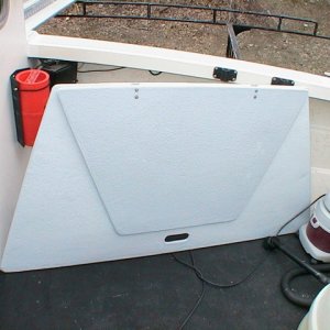 hinges; i used two stainless ones that came off of an engine cover for a larger boat (salvage parts) I'm sure a piano hing would have been better :o|