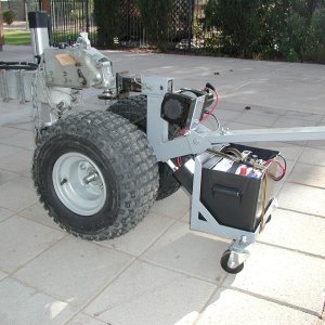 Trailer mover built from plans obtained on Ebay.  Based on modified winch normally used on all terrain vehicles.  Chain drive.