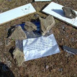 There was this little triangular "target" on the hill above Reid Harbor, with a note and a forgotten pocket knive. I tucked the knife under the note for safe keeping, hopefully the owner found it.