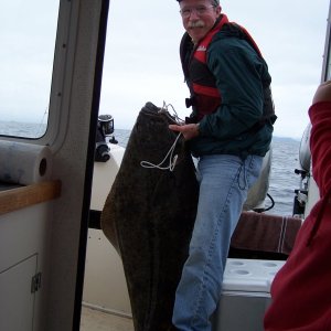 (C-Biscuit) Just getting Alisha's fish on board the 'Biscuit