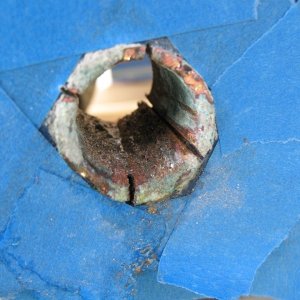 Old tube, last cuts. I got nervous at this time, because as I got close to all the way through the 6 o'clock cut, water started to lubricate the saw blade.  Uh-oh.