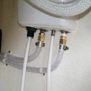 Media 'Shower hoses (under galley cabinet) showing new fittings' in album 'Our new boat!'