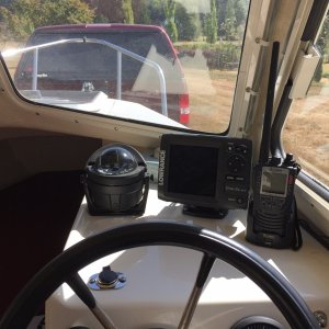 Compass, fish finder/GPS mapper, VHF radio