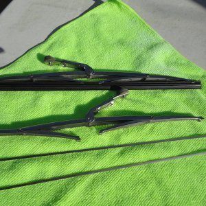 Media 'Old rubber removed, SS strips saved to use with new rubber' in album 'Old bad wiper blade in holder'