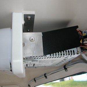 Media 'Side view of my mounting system for the Sony unit.  Just a piece of King starboard and piece of aluminum angle.  Works well.' in album 'Sony marine stereo mounted under shelf in custom bracket of my design.'