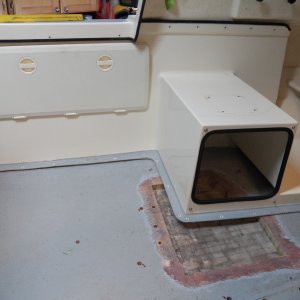 This new hatch is the proposed location for an Espar D2 Diesel heater. The heater is a little smaller than a football, but on a CD 16 even that amount of room is hard to find. It appeared that an access hatch in the cockpit panel would provide enough room. These hatches were available in "Seafoam," a color that some websites said was discontinued. It matches pretty good.
