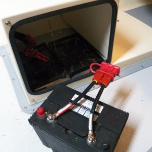 The house and starter battery were moved from under the splash well to the passenger side seat box to improve the trim of the boat.  The batteries have Anderson connectors to allow them to be unplugged and removed.