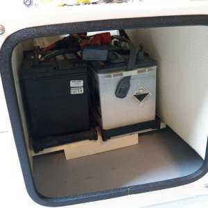Media 'A little shelf made out of Azek allows them to sit side-by-side under the seat box.' in album 'This new hatch is the proposed location for an Espar D2 Diesel heater. The heater is a little smaller than a football, but on a CD 16 even that amount of room is hard to find. It appeared that an access hatch in the cockpit panel would provide enough room. These hatches were available in "Seafoam," a color that some websites said was discontinued. It matches pretty good.'