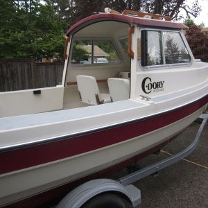 At home. Did not trust original trailer, stopped at Master Marine on way home to buy new trailer.