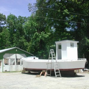 Media 'A 40ft wooden boat built by Francis Haynie, a good neighbor across the street.  This boat will be in National Fishermen very soon.  He\'s a Pro!' in album '(Otter-BelleHavenMarina) Charlie has all the toys'