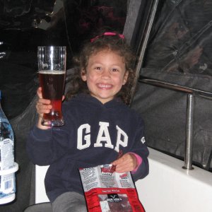 Nevaeh enjoying a beer in the cockpit...no she really wasn't drinking it.