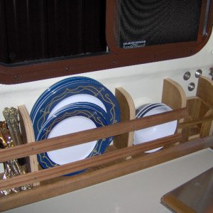 Liquid soap goes in the back slot.