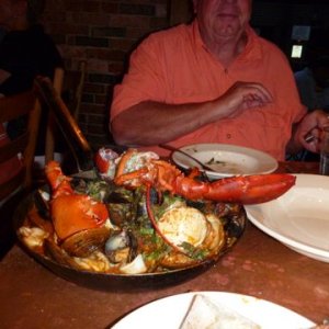 Lobster Diavlo for two ($47.50) at Portland's Street and Company restaurant. A pretty big lobster split, clams, mussels, calamari over linguine in a mildly spicy light red sauce. It fed us twice. Best meal we ever had. Me ready to pick out some items for my plate