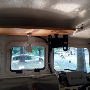 Media 'phone holder, ipad holder, and caframo fan' in album 'Filling the smaller holes and the two openings for the hour meters. the hour meters will get moved down slightly to allow for a voltmeter for each engine'