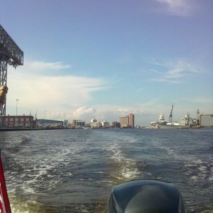 Cruising south on the Elizabeth River past the Naval shipyard.  Portsmouth in the background.