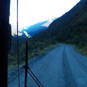 At the hydro station, we caught another bus to Doubtful Sound.  That is Doubtful in the distance.  It gives a little insight in to how steep this road is.