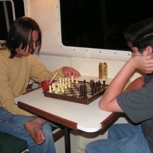 Media 'What the kids did during the 'big blow' and waves -- trying to keep their minds off the howling.' in album 'The crew: My friend Ron (center), his grandson Simon (left) and my son Miles (right).'