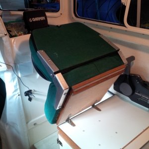 Media 'forward folding helm seat' in album 'hatches, fuel fills, rod holders, downriggers back cut, filled with epoxy and glassed'