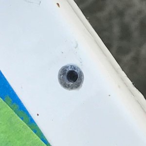Screw holes re-drilled.