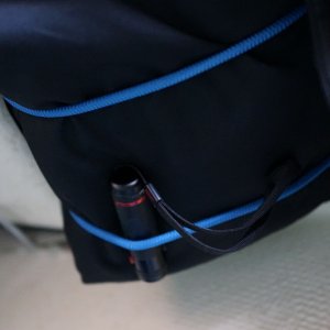 Flashlight under the bungee (glasses at night also)