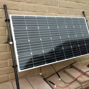 Here's the rack/solar-panel leaned up against the house.