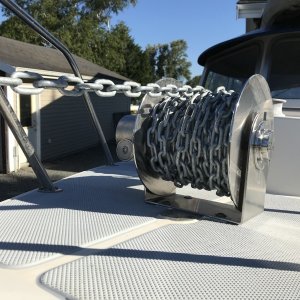 EZ Anchor Patriot 2. This is the best upgrade I have made. Push of a button deploy and retrieve. No more wet rope in the cuddly.