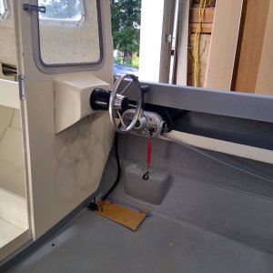 I do a lot of trolling for Salmon, I needed steering and throttle on the deck. I built the helm mount by modifying one I had on hand from a Livingston. Steering is a Baystar system, Mercury Shift Throttle control. I love the set up. 10? Garmin plotter / Sonar not show.