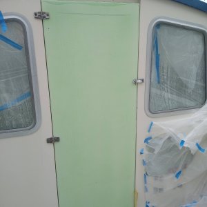 Door is installed for test fit. I was pretty happy with how it turned out, not perfect but better than the old one. The green coating is the PVA, it washes off with water. Window was installed using the old door as a pattern.