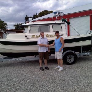 sold the carver and purchased the c-dory.  then sold the c-dory, misty seas, to jim, picutred with me above, and purchased  my last boat: 2006 sea ray