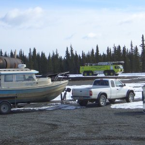 (catdogcat) Another Filthy boat pic.  Thats my daughter taking laps in the fire truck in the background.