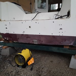 put the boat on blocks supported at the chines to keep the hull from warping