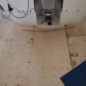 drilling holes to allow moisture out