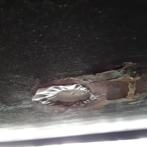 bottom after removing the 3d printed plug and bottle jack