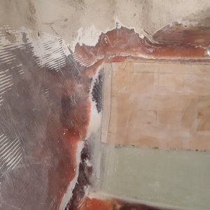 grinding down sharp edges so the glass can lay down