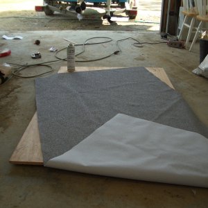 (catdogcat) Got the idea for vinyl flooring from my friend that runs an upholstery shop.  This is really stout stuff and has really good traction.  Very waterproof.
