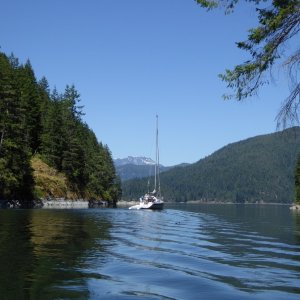 Sailboat leaving the Octopus Islands through the narrow channel