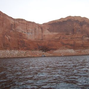 Houseboat and canyon wall.