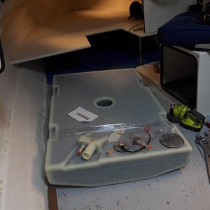 I thought that it might fit by just removing one of the supports for the V berth.  Nope, they both have to come out.  That's okay as it turns out that they are also just screwed directly into the balsa core.