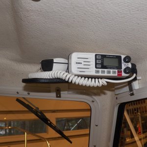 Media 'So the radio got moved to a shelf above the window, a position I prefer.  I noticed when moving the radio that the compass, which was on the same plane as the radio, shifted more than 10 degrees.' in album 'I bought a 23 gal. tank from overstock.com for $140.  It was made by Moeller and used on Lund boats.  In 2011, boat manufacturers were required to install low permeable tanks when they ran out of their older stock. Low permeable tanks have a black nylon lining (as can be seen here).  There are still a lot of older style permiable tanks being sold even though they are new old stock and unused. BoatUS did an experiment where they found that an old style 6 gallon plastic outboard tank lost almost a pint in 6 months.  That's why gas goes bad.'