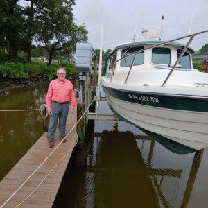 My boating friend Steve, with Osprey, a 26 Venture, the Cadillac of C-Dory's, in Virginia.