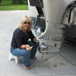 Joan cleaning the Honda