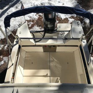 Bimini top also includes three piece camper back with clear vinyl windows and screens.