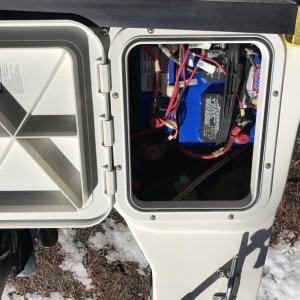 Port lazarette with new hatch and 12 volt starting and house battery.